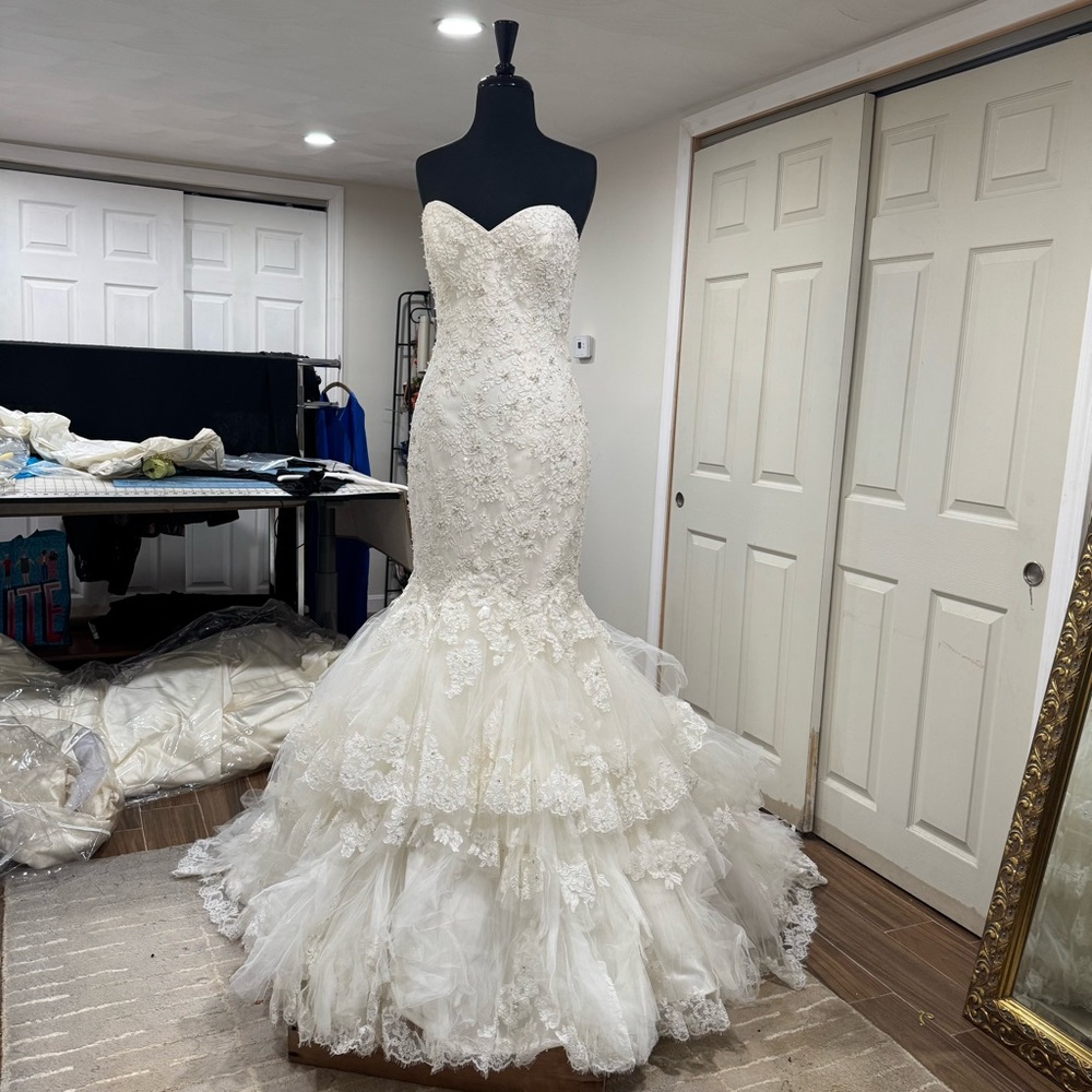 Strapless beaded fit and flare wedding gown